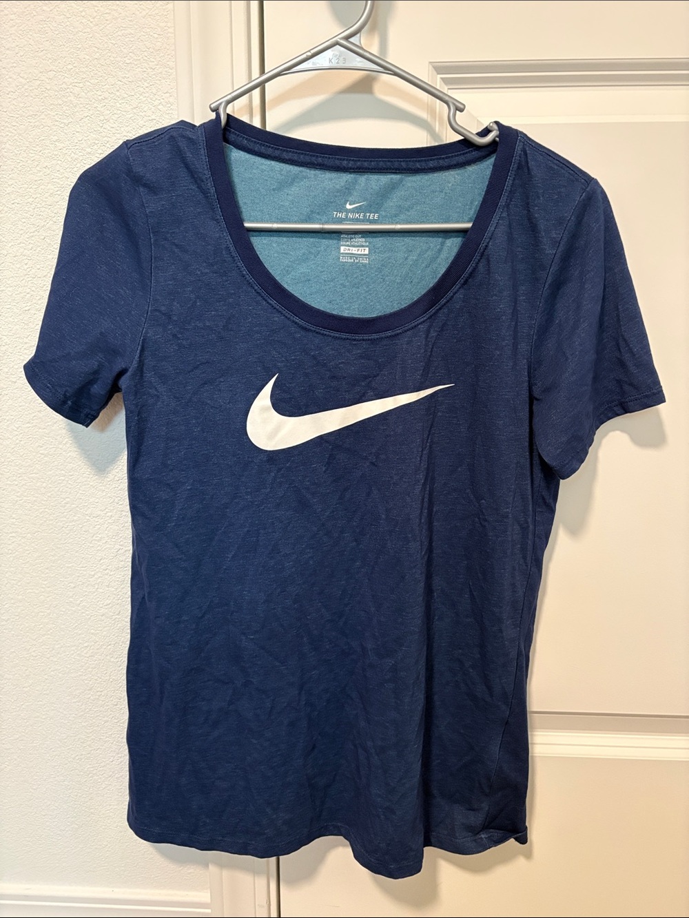 Nike Women's Navy Blue Scoop Neck Tee with White Swoosh